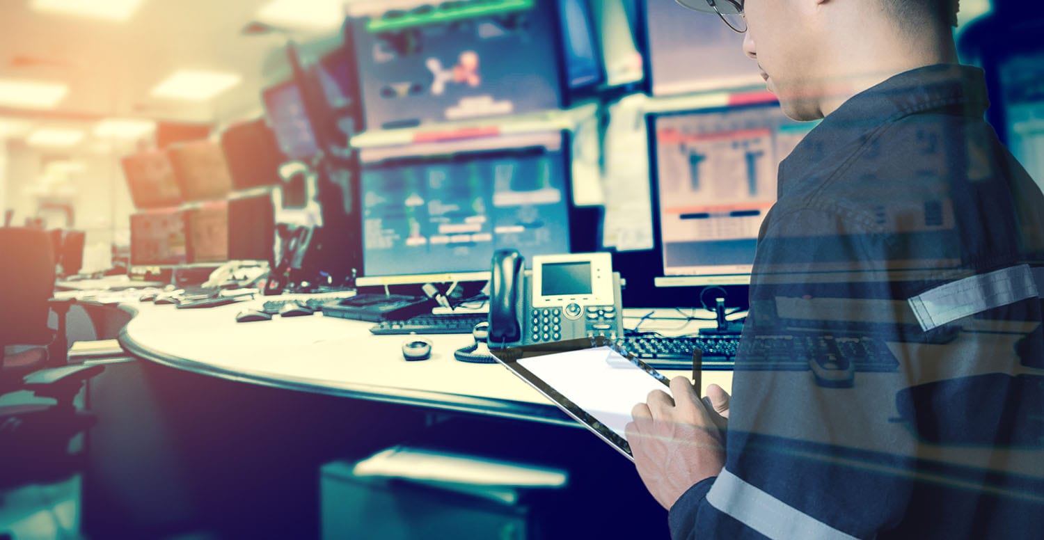 Double exposure of Engineer or Technician man in working shirt working with tablet in control room of oil and gas platform or plant industrial for monitor process, business and industry concept